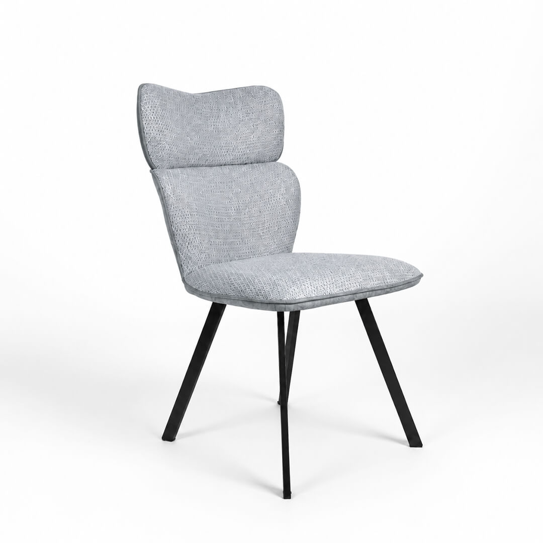Καρέκλα τραπεζαρίας VITRA σε light grey textured ύφασμα με ψηλή πλάτη και μαύρα μεταλλικά πόδια σε λευκό φόντο.