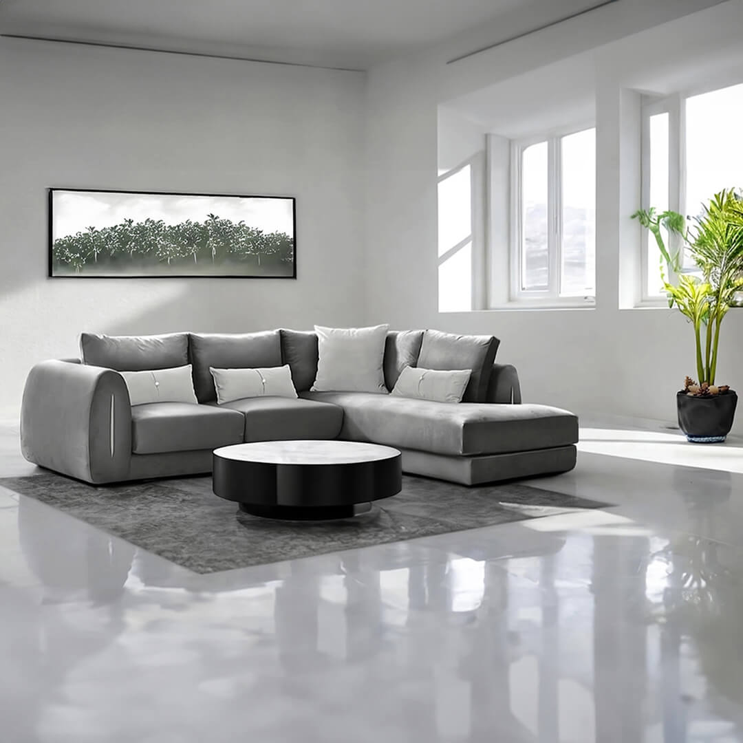 Μοντέρνος γκρι γωνιακός καναπές Ted με εξαιρετικά πλούσια μαξιλάρια, βαθύ κάθισμα και χαρακτηριστικά φαρδιά, στρογγυλεμένα μπράτσα με πλαϊνή λεπτομέρεια.