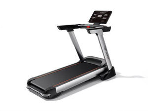 GT-PRO professional folding treadmill with adjustable speed and incline, featuring a large LED screen and sensors on the handlebars.