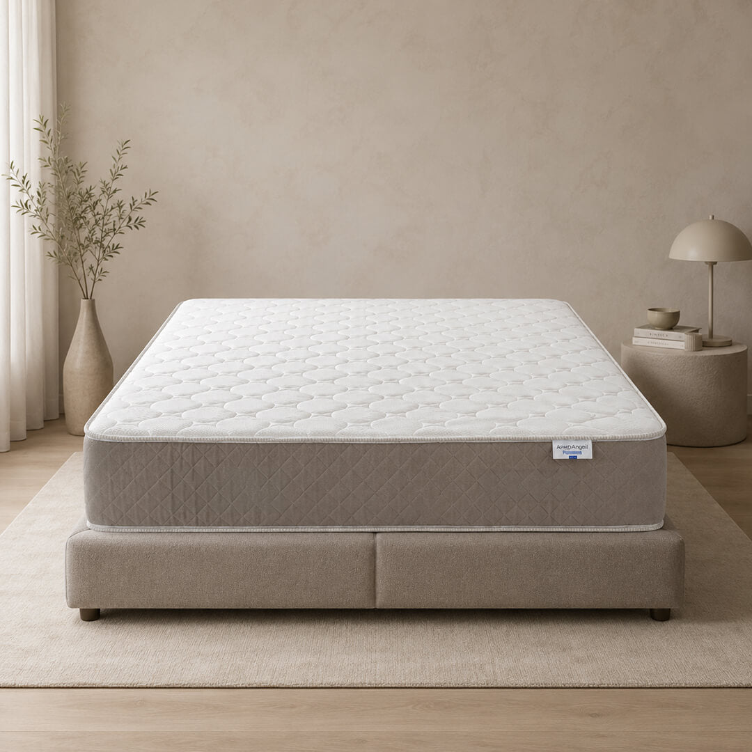 ergonomic mattress placed on a bed platform in a minimal room
