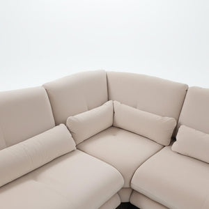 Detail of the corner composition of the Ermis sofa in beige velvet fabric