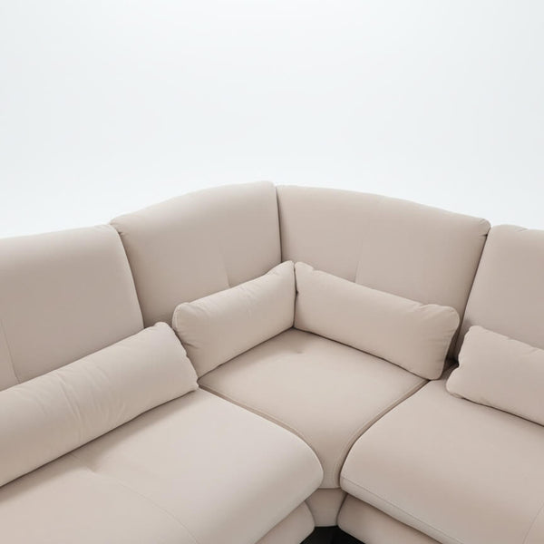 Detail of the corner composition of the Ermis sofa in beige velvet fabric