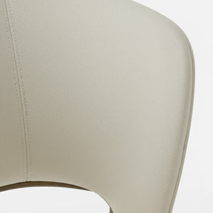 Крупный план спинки и фактуры microsuede стула Nexus. / Beige