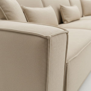 Λεπτομέρεια υφάσματος microfiber και ραφής του καναπέ Nur σε μπεζ χρώμα. / Beige