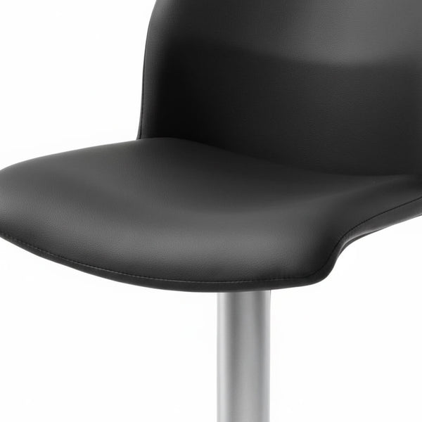 Close-up of the ergonomic black seat of the GB bar stool